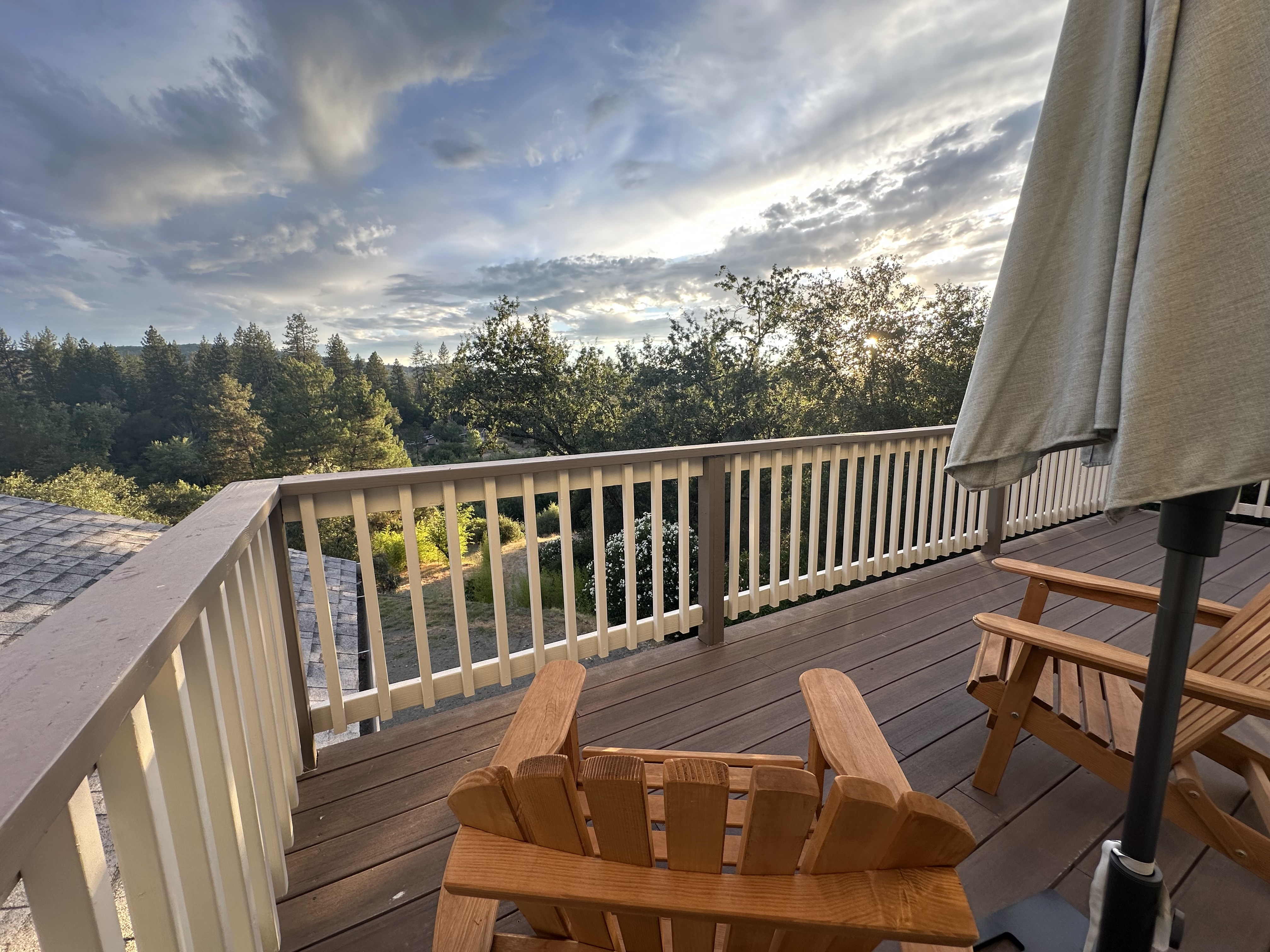 Deck with chairs at sunset