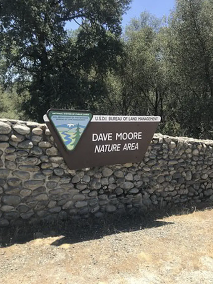 The stone entrance sign to the Dave Moore Nature Area